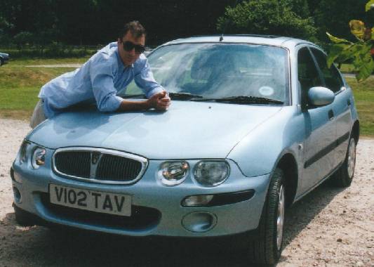 which do you prefer, a colour co-ordinated shirt with the car or 2 smiley happy people?