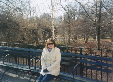 Caroline in Central Park by the Dacotta Building